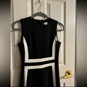 -worn 1 time
-rich thick quality fabric
-style with black / white heels